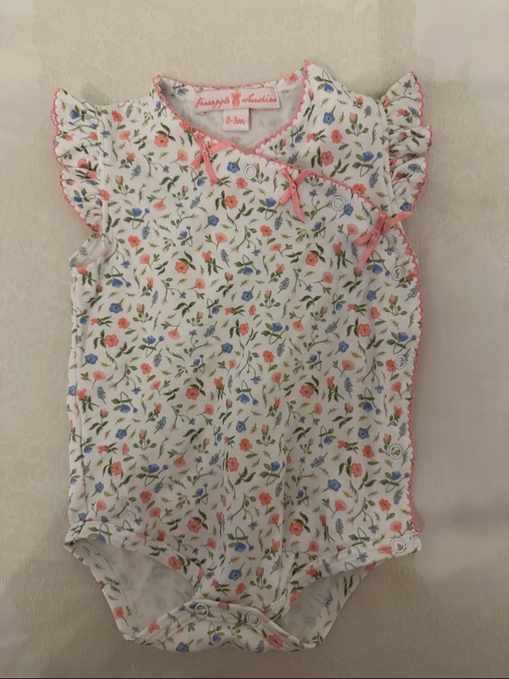 Floral Baby Onesie with Pink Trim